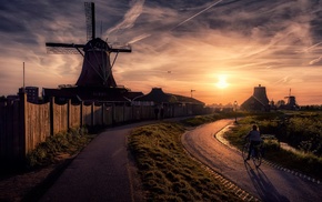 Netherlands, windmills, sunset, fence, road, clouds