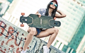 model, skateboard, jean shorts, girl, girl with glasses, sitting