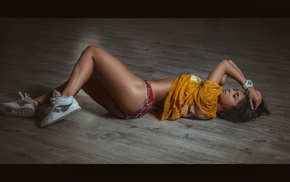 girl, hands in hair, on the floor, wooden surface, closed eyes, ass
