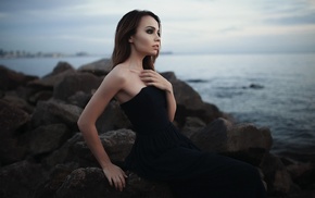 girl, sea, sitting, rock, black dress, looking away