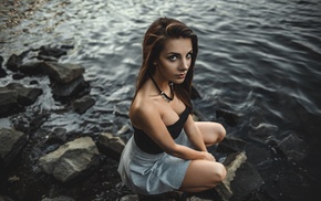 rock, looking at viewer, sitting, girl, skirt, portrait