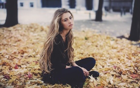 girl outdoors, blonde, looking away, sitting, girl, black clothing