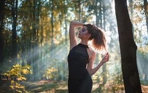 black dress, closed eyes, girl outdoors, sun rays, girl