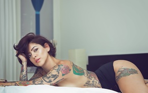 in bed, topless, looking at viewer, tattoo, girl