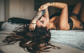 in bed, brown, tattoo