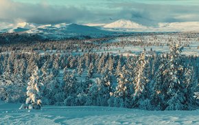 Winter Sunset Landscape With Snowy Peaks