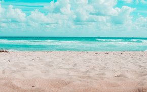 Ocean Sand Horizon With White Clouds