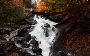 Wooden Bridge Over Autumn Waterfall