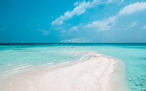 Beach Horizon With White Sand And Blue Sky