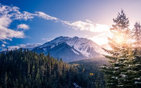 Snow-Capped Peaks At Sunset In Banff