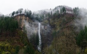 Multnomah Falls Cascading Through Morning Fog
