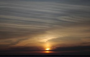 Frozen Lake Sunset With Clouds