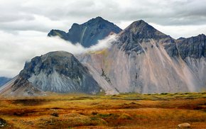 Hvalnes Mountain Range With Lush Grass