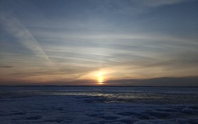 Frozen Lake Sunset in Finland
