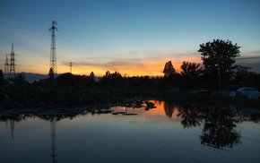 Lake Sunset With Power Line Silhouettes