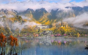 Lake Scene With Boat And Mountains